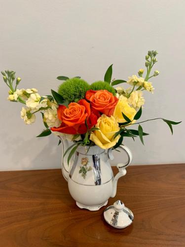 Part of the tea pots project, this arrangement is as bright as sunshine with its yellow and orange combo.