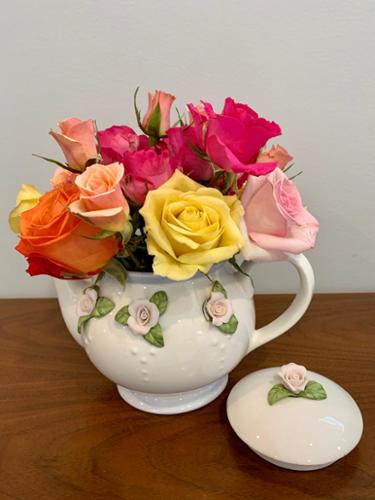 Part of the tea pots project, different types of roses in different colors added character to this piece.