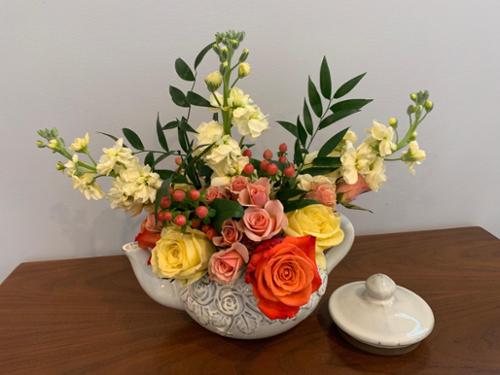 Part of the tea pots project, this arrangement came to life by using leftover flowers.